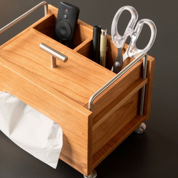 Scandinavian cherry wood tissue box sort in panoramic view.