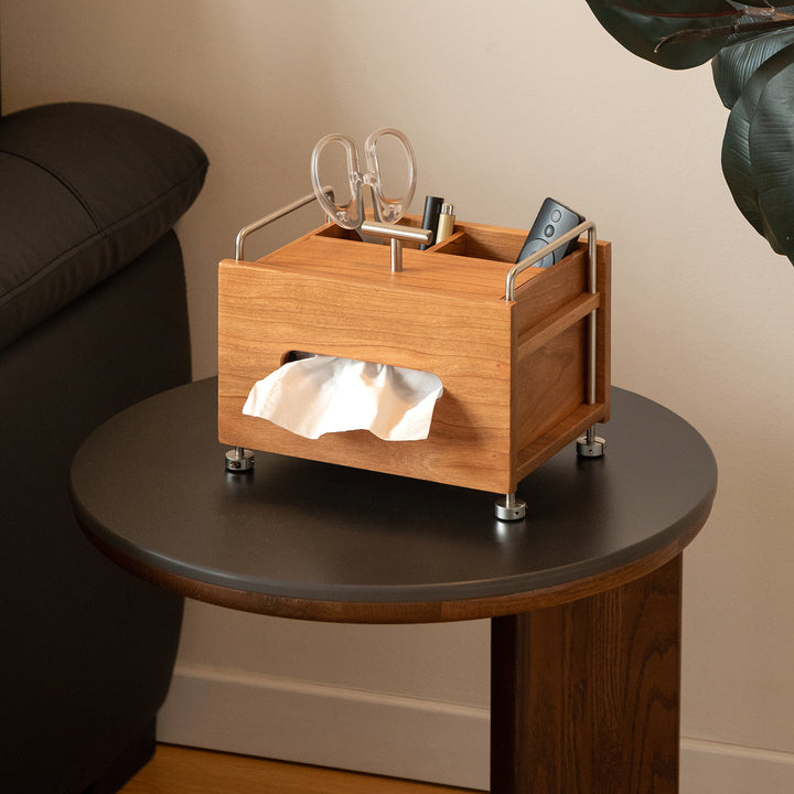 Scandinavian cherry wood tissue box sort in close up details.