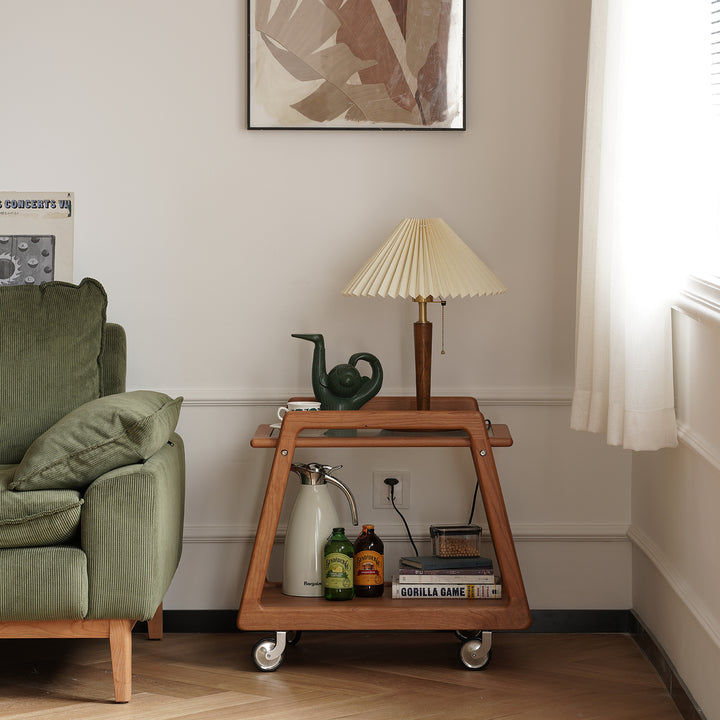 Scandinavian cherry wood wheeled trolley side table yoyo in panoramic view.