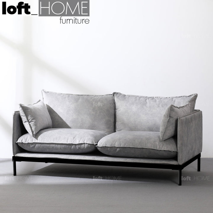 Scandinavian fabric 2 seater sofa liam in real life style.