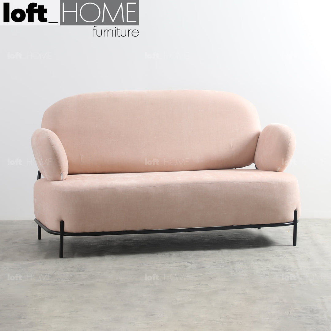 Scandinavian fabric 2 seater sofa lucia in still life.