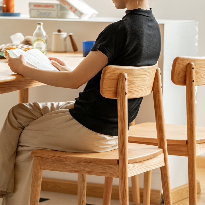 Scandinavian oak wood  dining chair green material variants.
