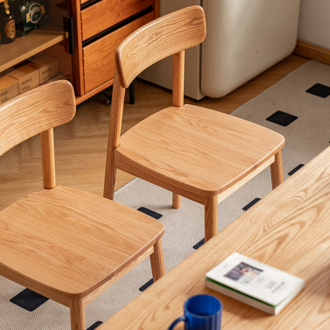 Scandinavian oak wood  dining chair green in real life style.