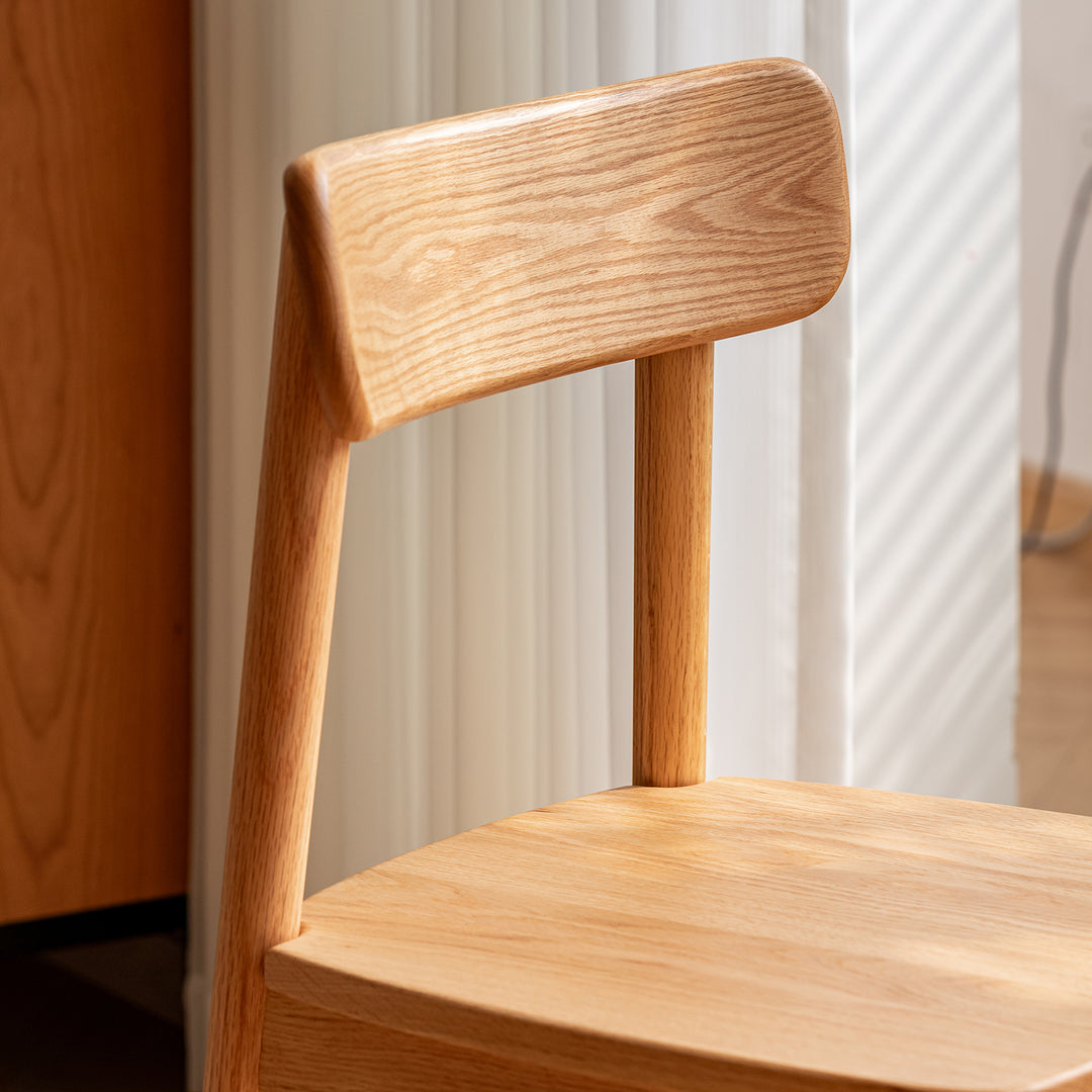 Scandinavian oak wood  dining chair green in details.