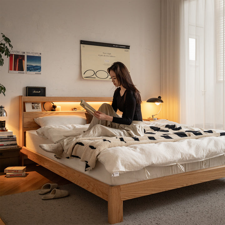 Scandinavian oak wood bed accompany light color swatches.