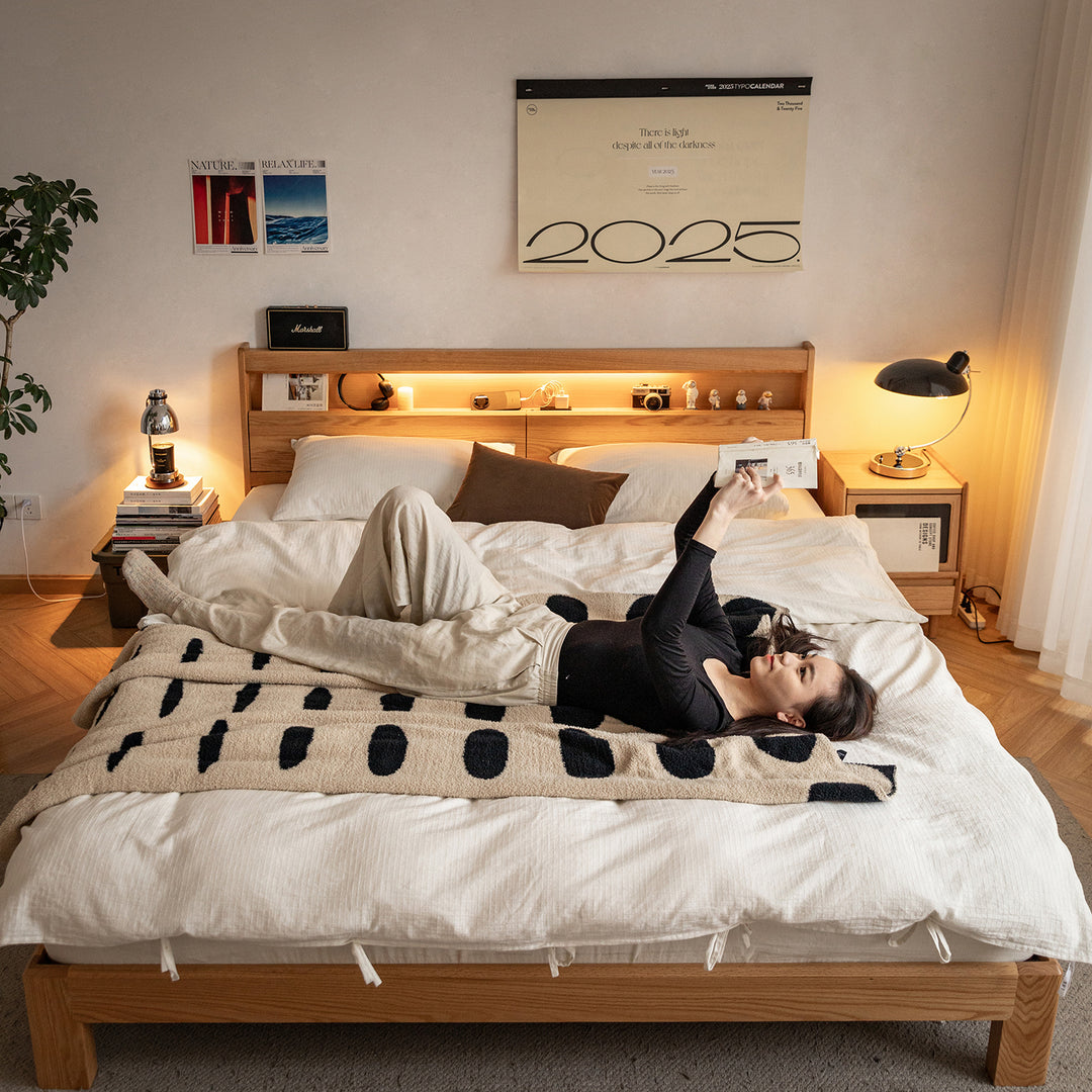 Scandinavian oak wood bed accompany light in real life style.