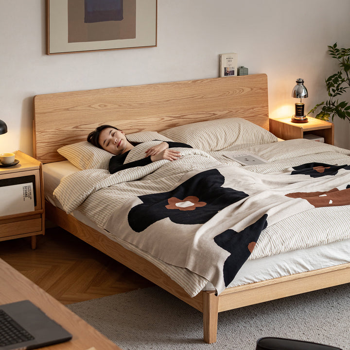 Scandinavian oak wood bed solid in panoramic view.