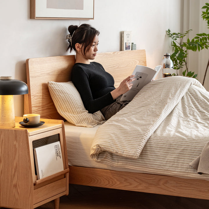 Scandinavian oak wood bed solid in still life.
