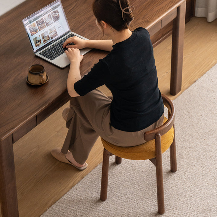 Scandinavian oak wood boucle fabric dressing chair turni in panoramic view.