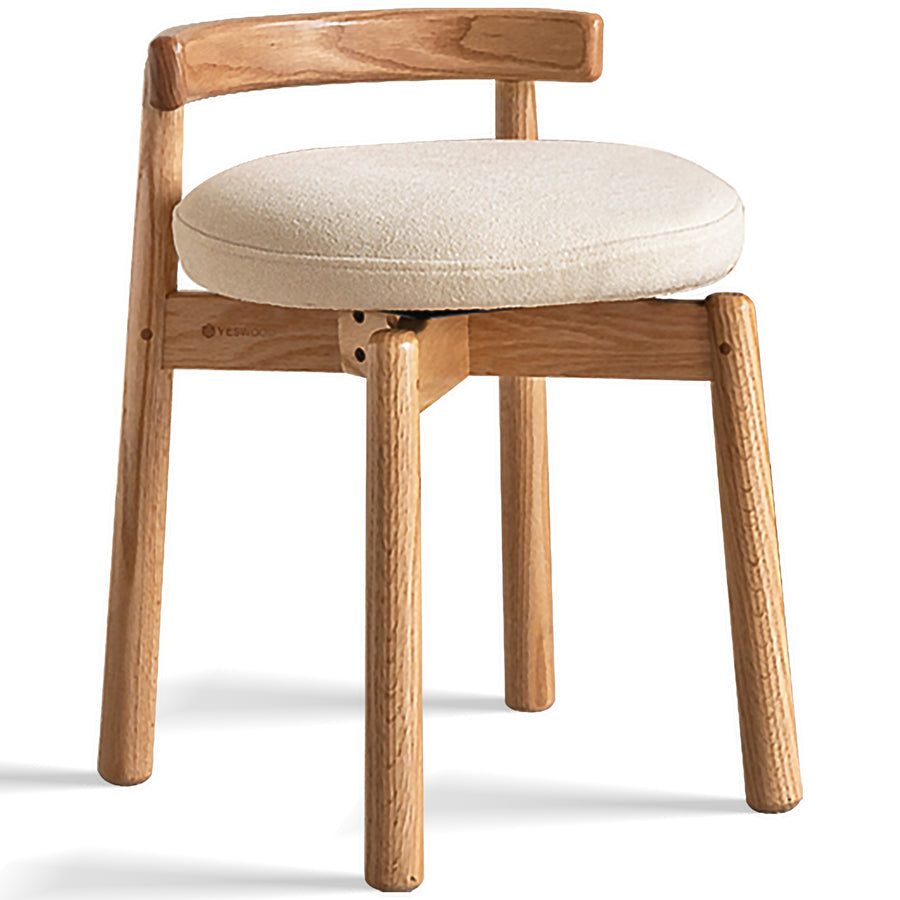 Scandinavian oak wood boucle fabric dressing chair turni in white background.