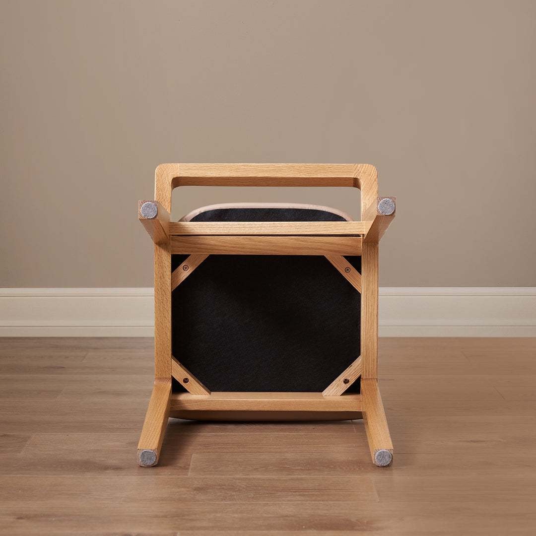 Scandinavian oak wood cat scratch resistant leather dressing chair hemu in panoramic view.