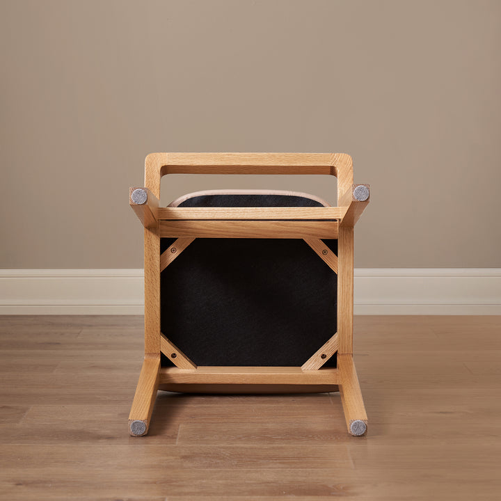 Scandinavian oak wood cat scratch resistant leather dressing chair hemu in panoramic view.