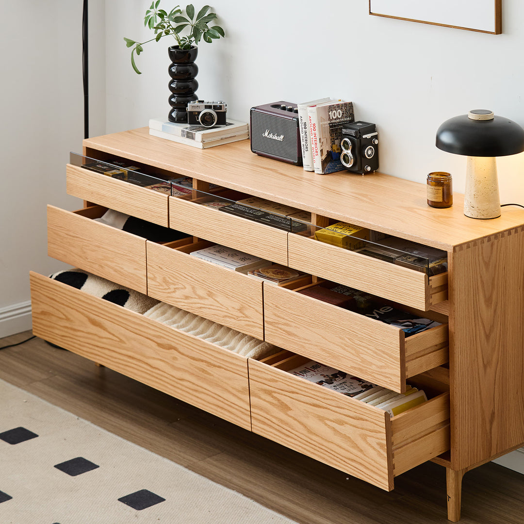 Scandinavian oak wood chest of 8 drawers floating light in details.