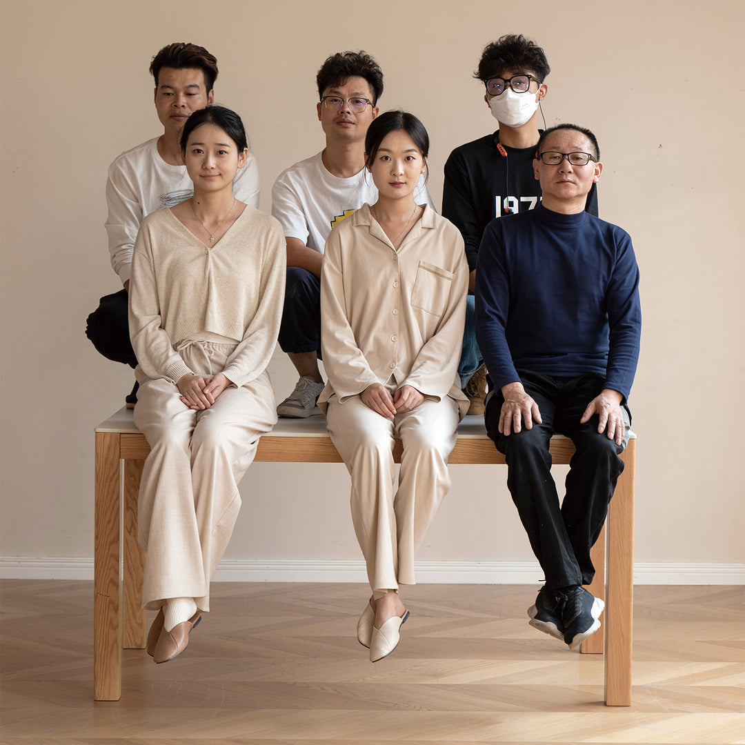 Scandinavian oak wood dining table elm in close up details.