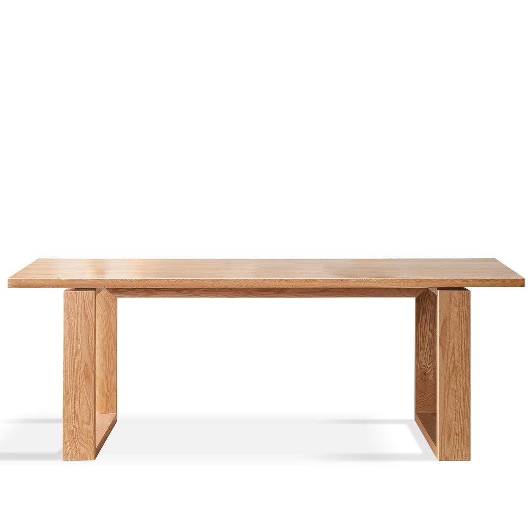 Scandinavian oak wood dining table kumo in white background.