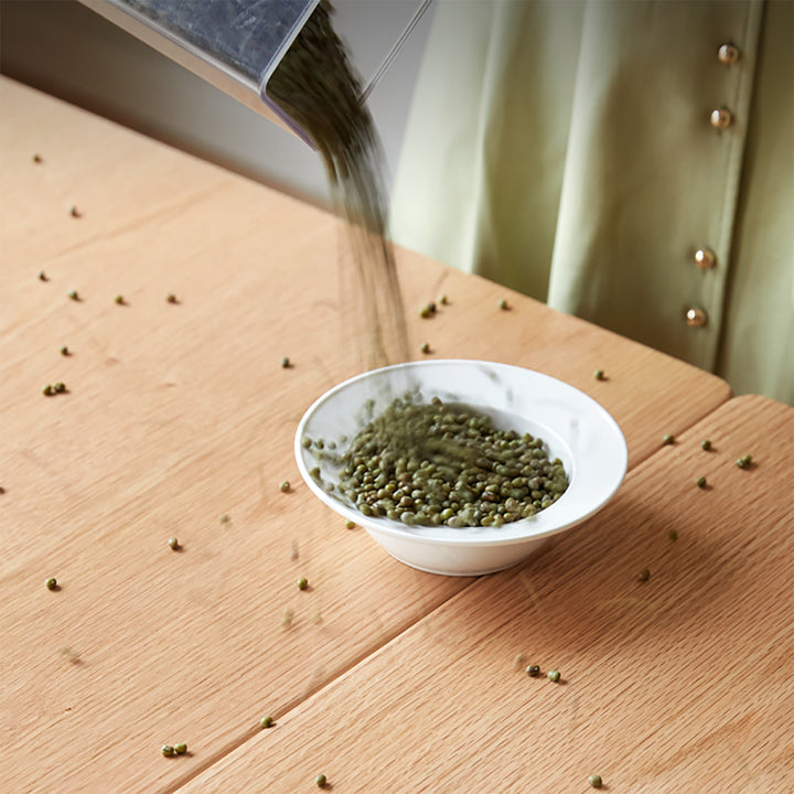 Scandinavian oak wood extendable dining table extendra in close up details.