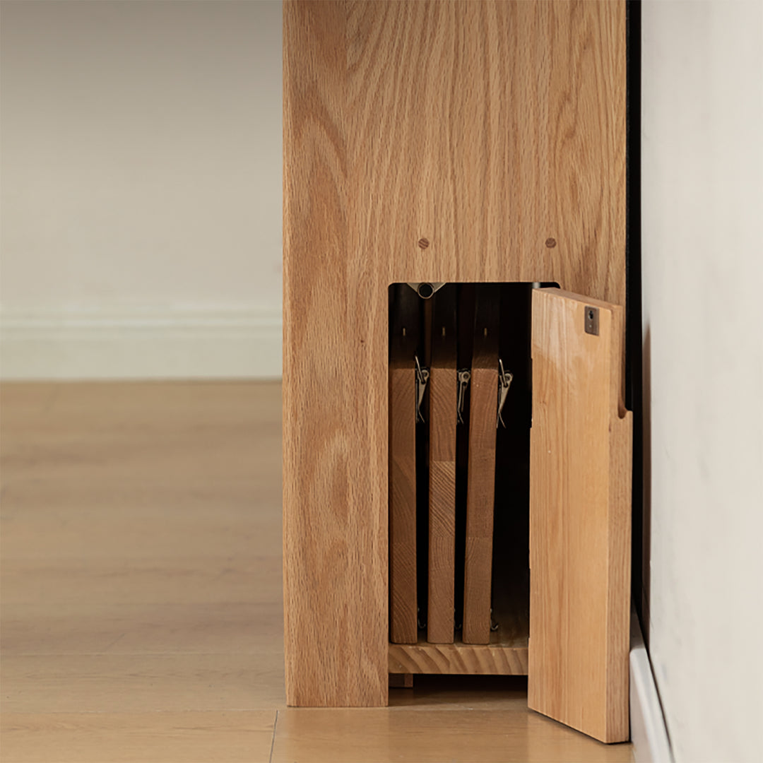 Scandinavian oak wood extendable dining table with shelf nest in details.