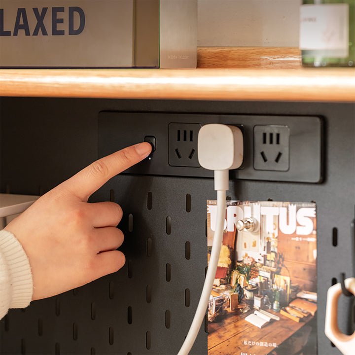 Scandinavian oak wood extendable dining table with shelf nest in close up details.