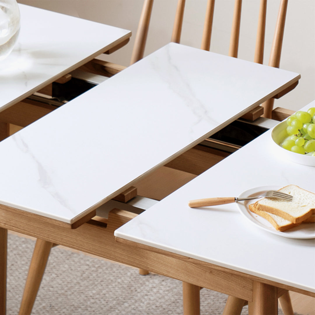 Scandinavian oak wood sintered stone extendable dining table shift with context.