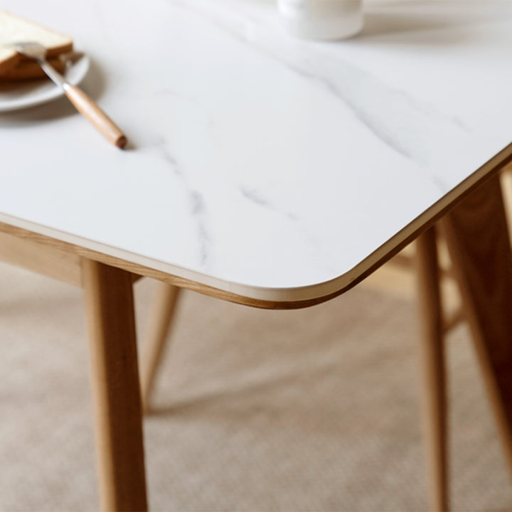 Scandinavian oak wood sintered stone extendable dining table shift in details.