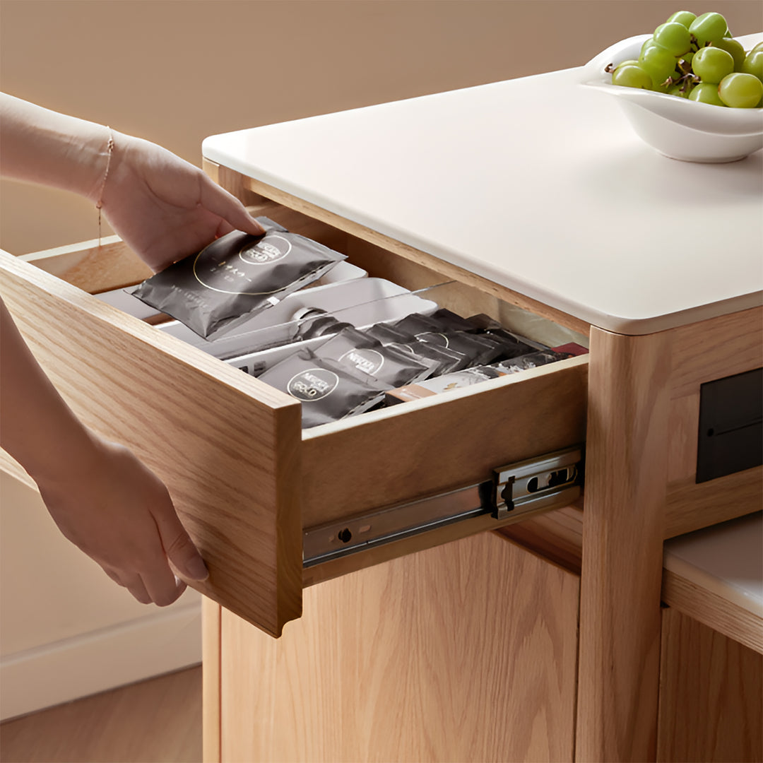 Scandinavian oak wood sintered stone extendable island dining table with cabinet flexa in still life.