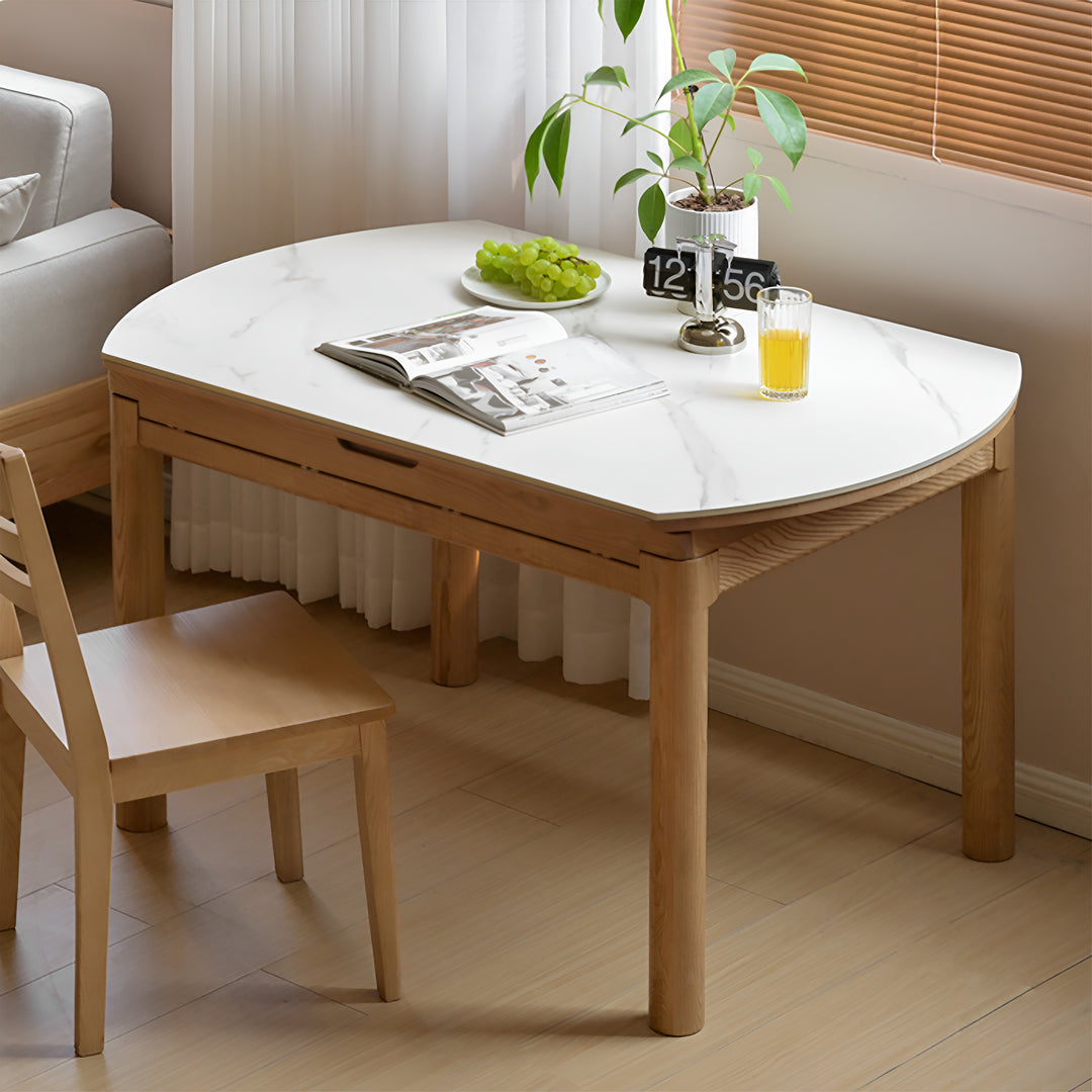 Scandinavian oak wood sintered stone extendable round dining table orbit material variants.