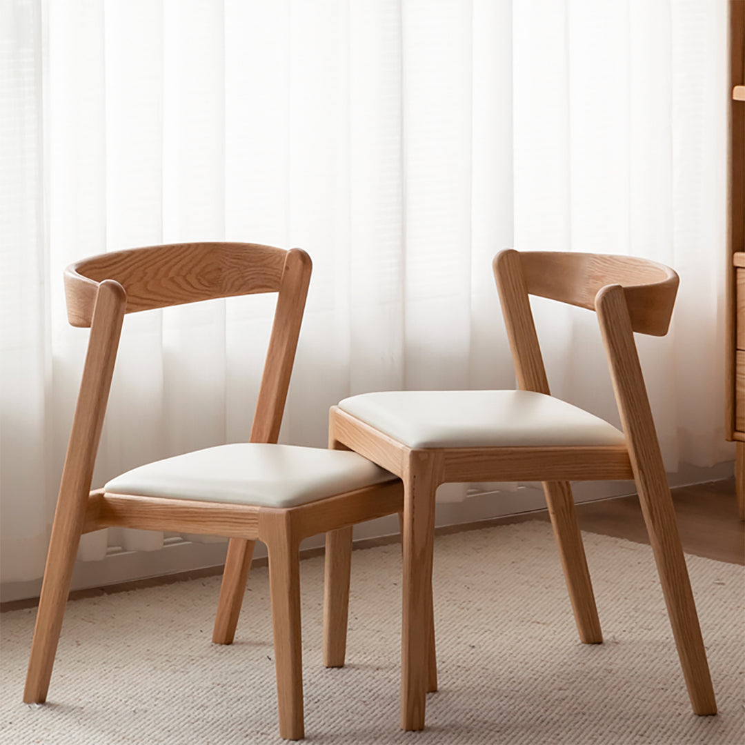 Scandinavian oak wood sintered stone stackable dining table set noki in panoramic view.