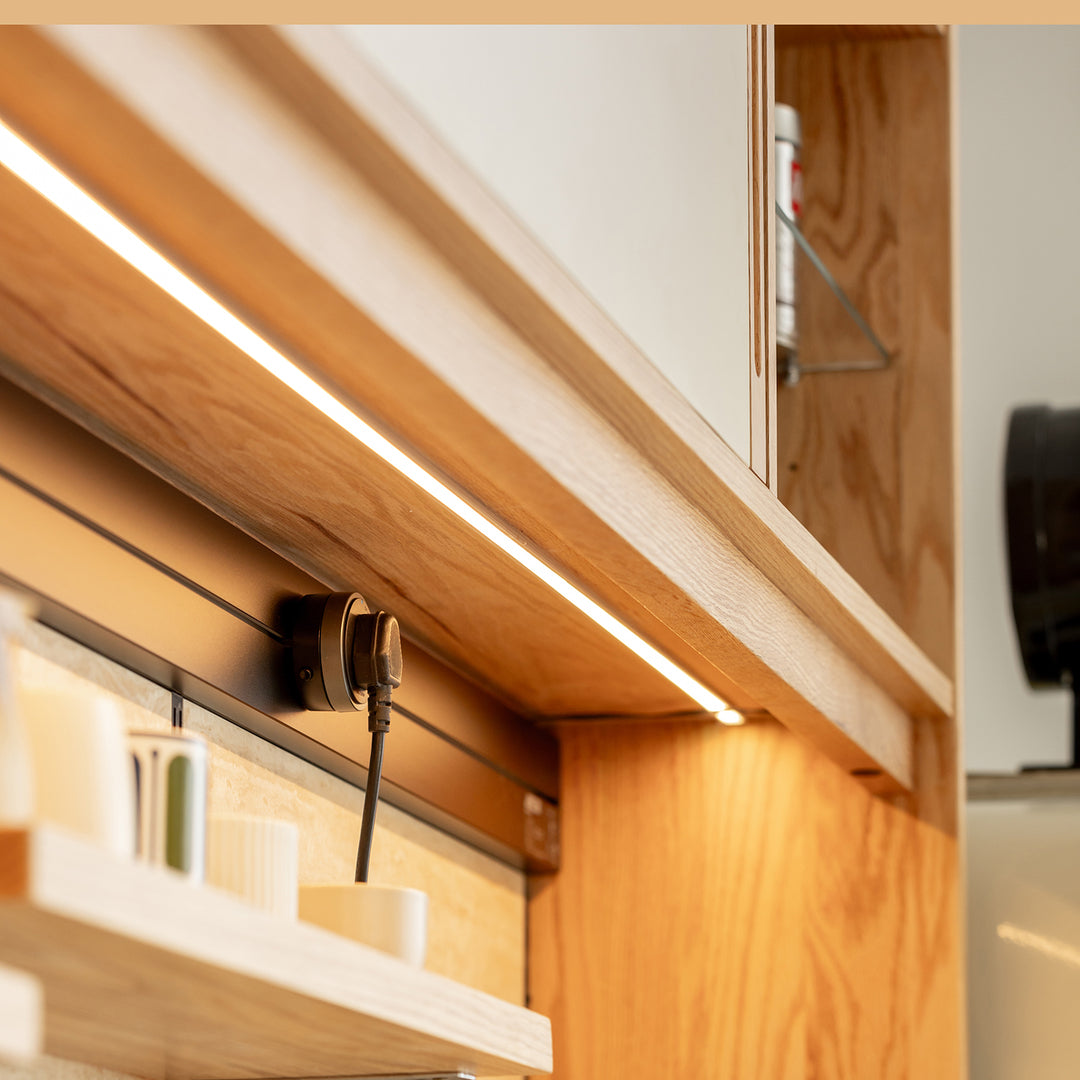 Scandinavian oak wood sintered stone storage side cabinet timeless in close up details.