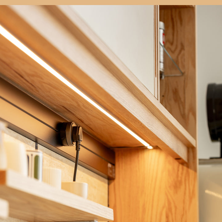 Scandinavian oak wood sintered stone storage side cabinet timeless in close up details.