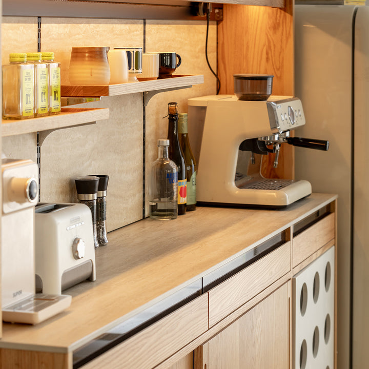 Scandinavian oak wood sintered stone storage side cabinet timeless in still life.