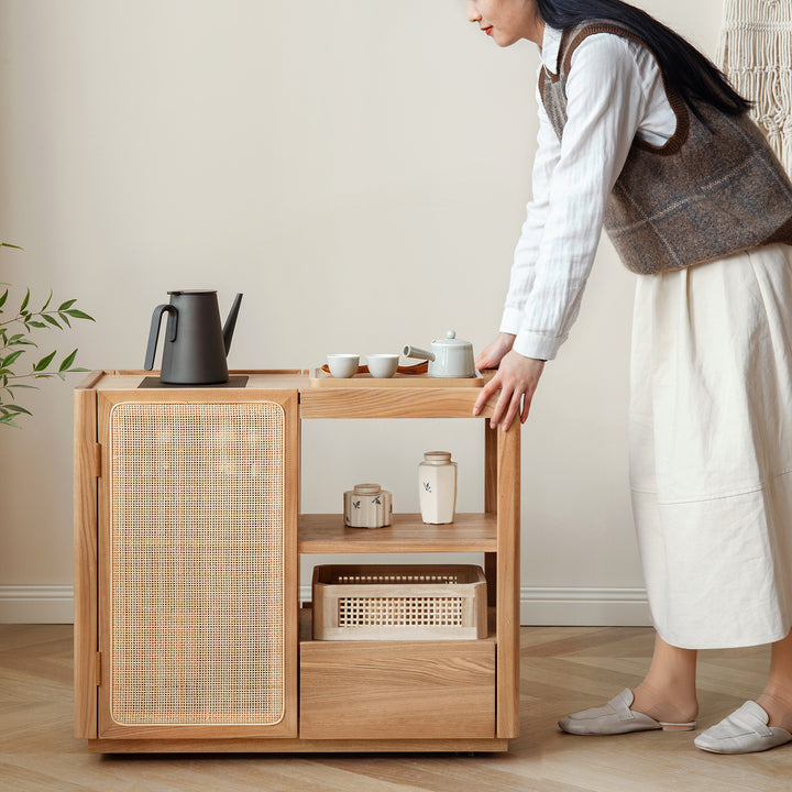 Scandinavian oak wood wheel tea side table vine in real life style.