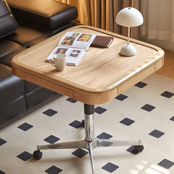 Scandinavian oak wood wheeled height adjustable gaming table coffee table drift in still life.