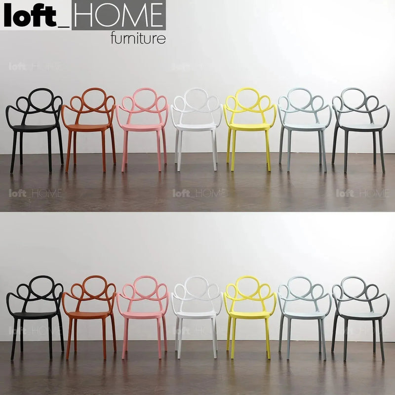 Bauhaus plastic armrest dining chair mina primary product view.