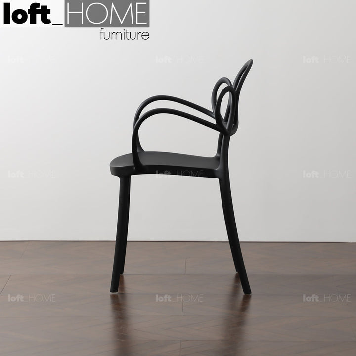 Scandinavian plastic armrest dining chair mina with context.