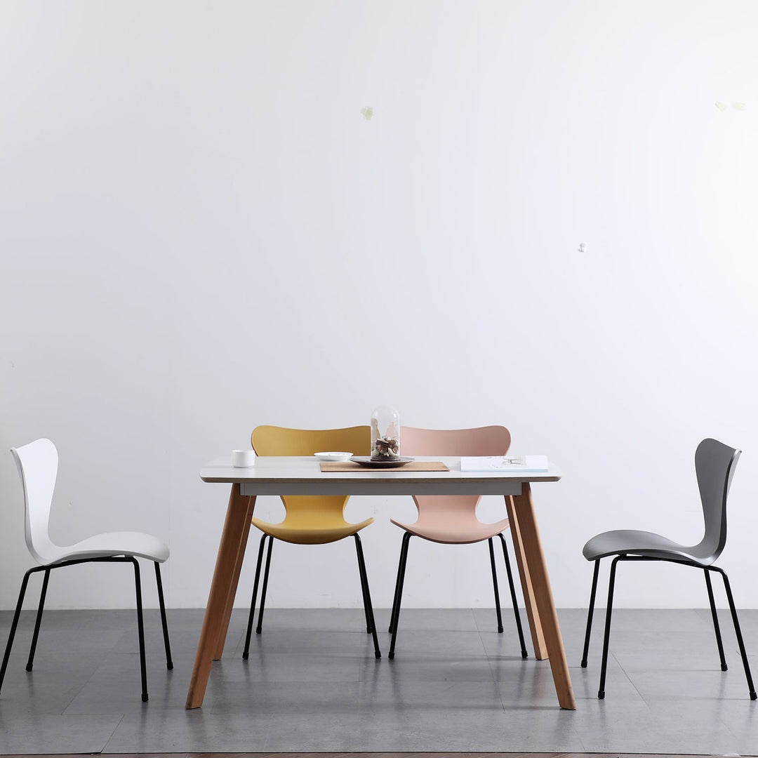 Scandinavian plastic dining chair ant in panoramic view.