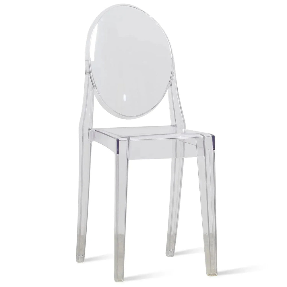 Contemporary plastic dining chair ghost vee in white background.