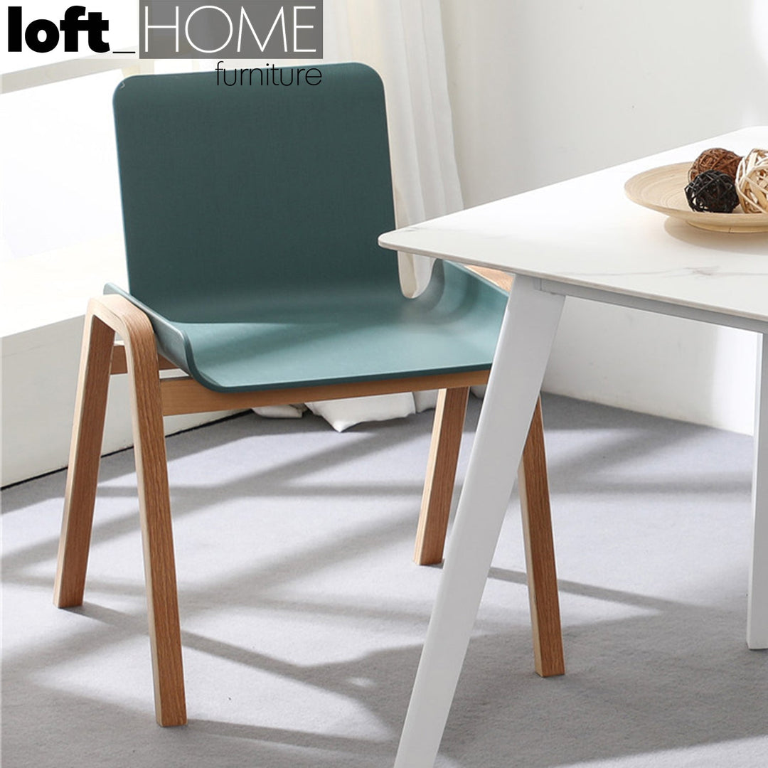 Scandinavian plastic dining chair larch in panoramic view.