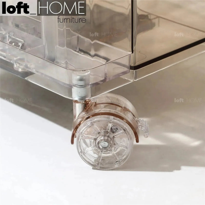 Bauhaus plastic wheeled trolley side table rolly clear in real life style.