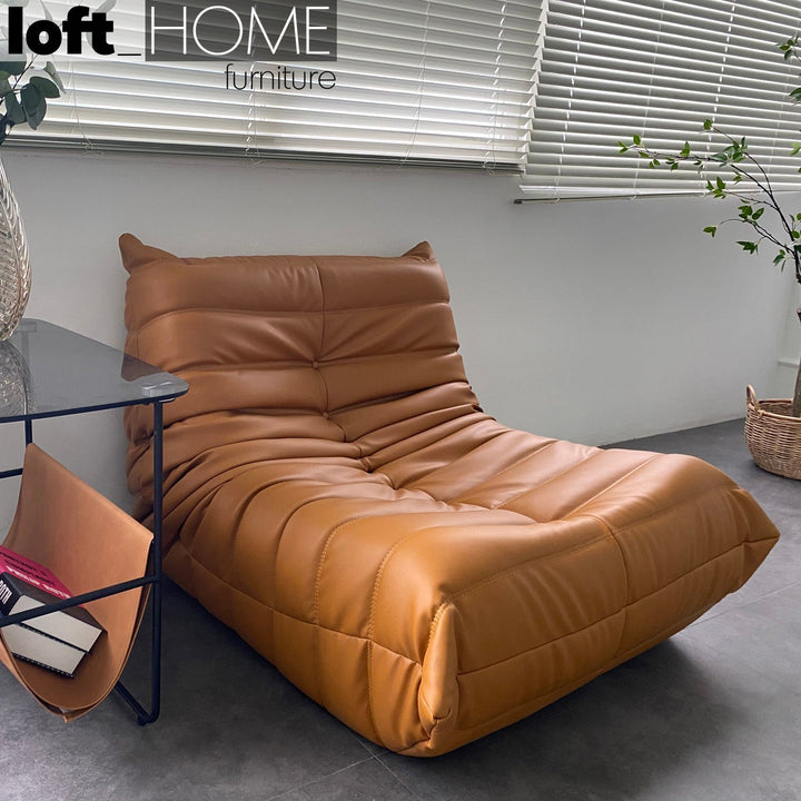 Scandinavian pu leather 1 seater sofa cater in still life.