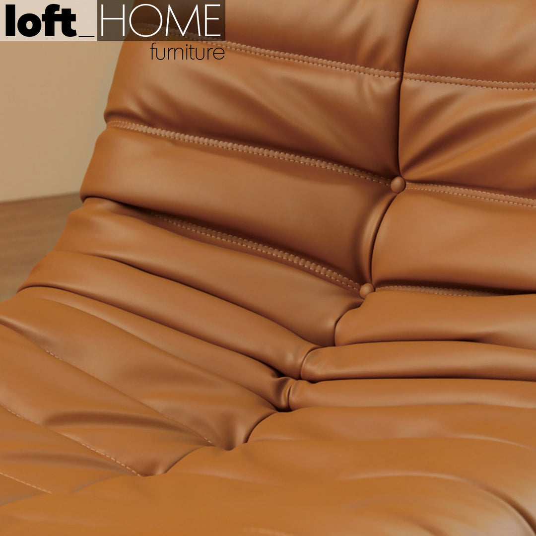 Scandinavian pu leather 1 seater sofa cater in close up details.