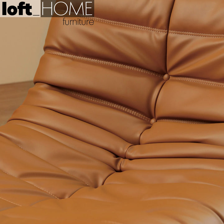 Scandinavian pu leather 1 seater sofa cater in close up details.
