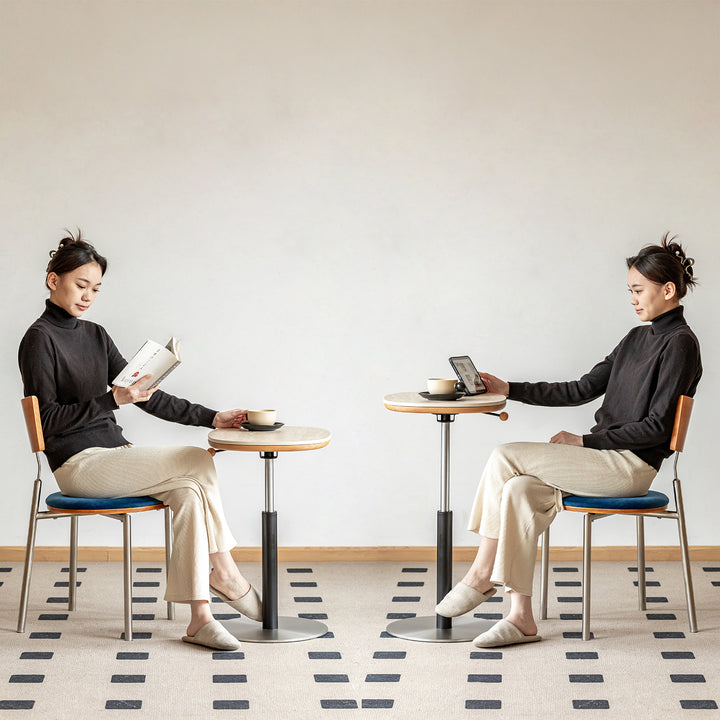 Scandinavian sintered stone height adjustable side table roman in panoramic view.