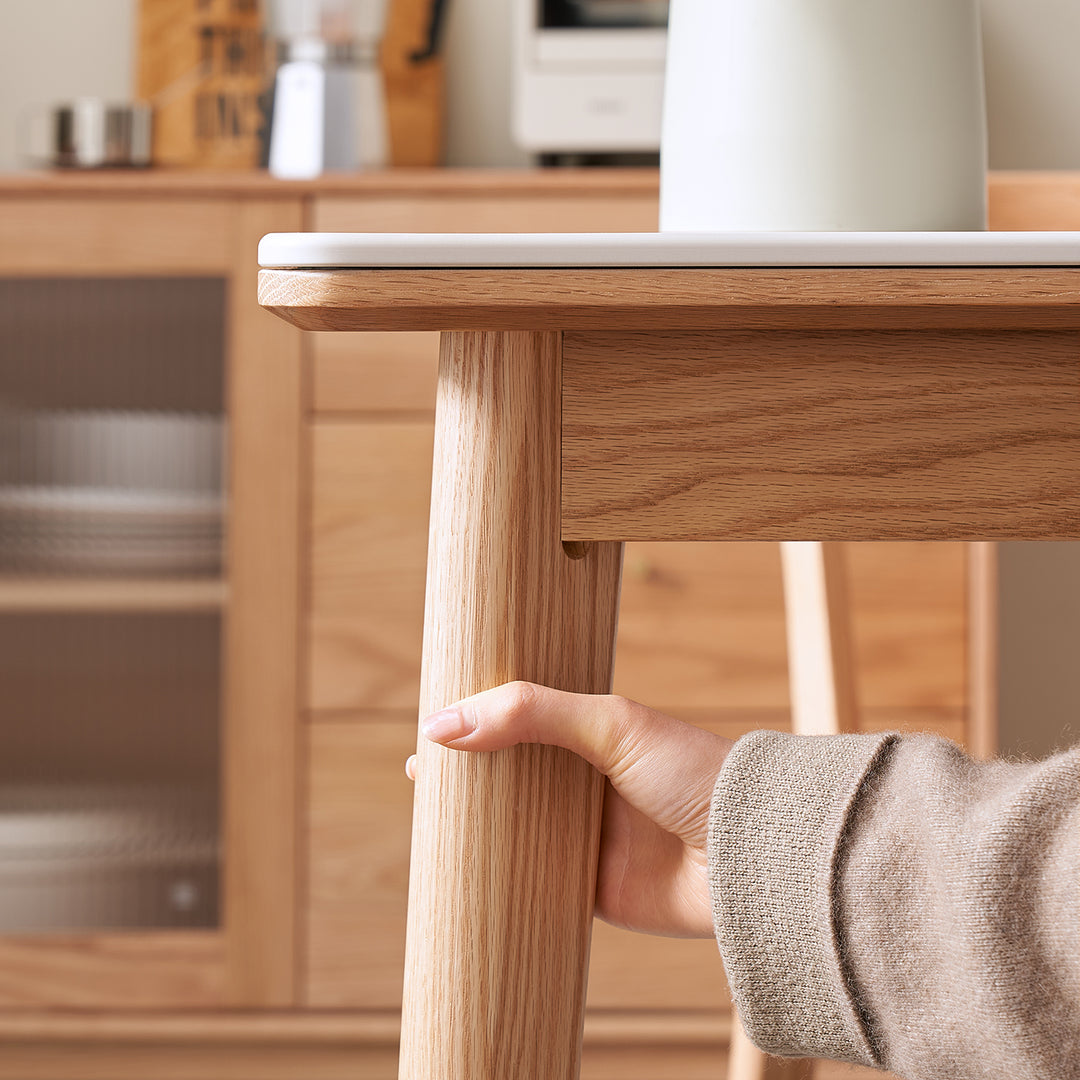 Scandinavian sintered stone oak wood dining table jaden in close up details.