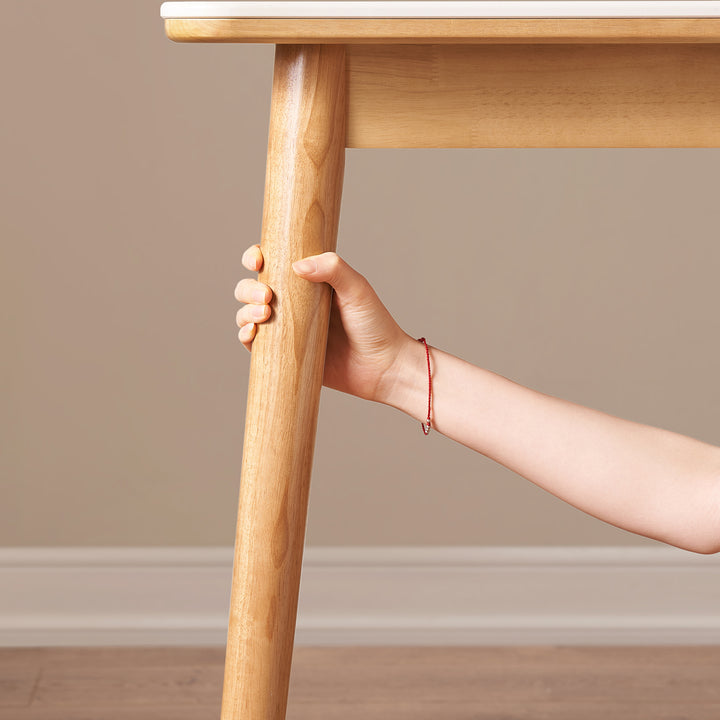Scandinavian sintered stone rubber wood dining table rowan in still life.