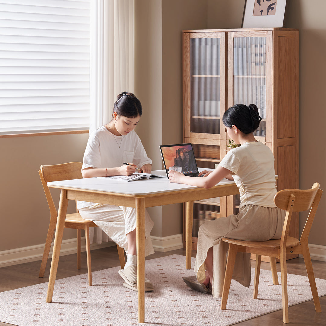 Scandinavian sintered stone rubber wood dining table rowan material variants.