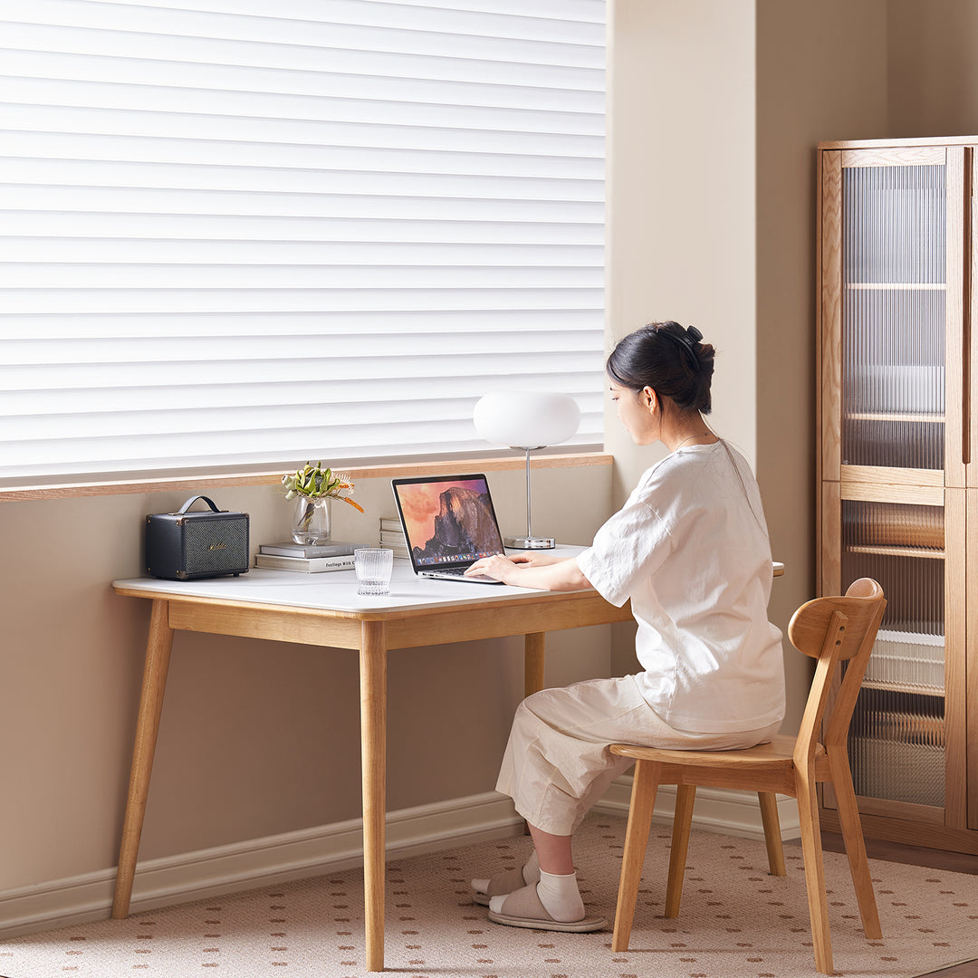 Scandinavian sintered stone rubber wood dining table rowan in real life style.