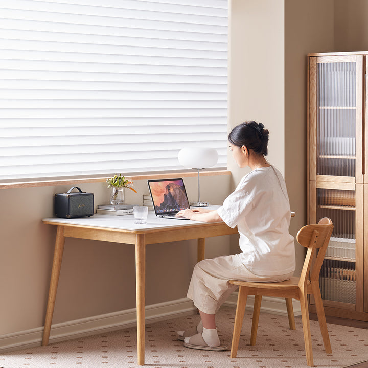 Scandinavian sintered stone rubber wood dining table rowan in real life style.