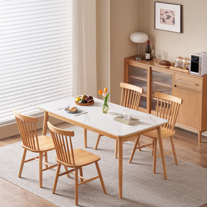 Scandinavian sintered stone rubber wood dining table rowan with context.