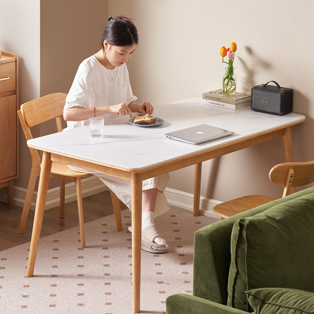 Scandinavian sintered stone rubber wood dining table rowan in close up details.