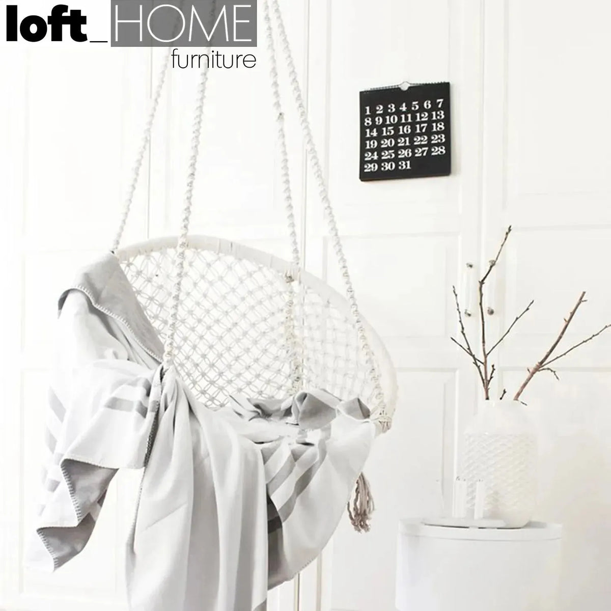 Scandinavian woven rope hanging chair 1 seater sofa net in still life.